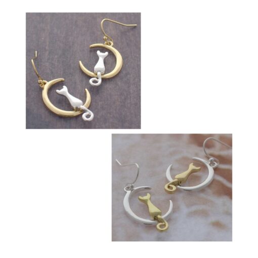 BACKWARDS CAT ON MOON PIERCED EARRINGS. GOLD/SILVER, SILVER/GOLD. SOLD IN SETS OF 2 ONLY.