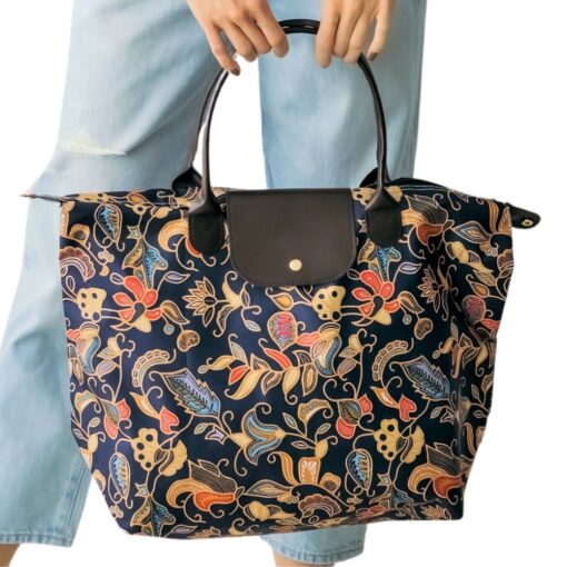 NAVY FLORAL FOLDABLE TOTE BAG. 20.5X14.5X7. SEE 29010 FOR ADDITIONAL PRINT.