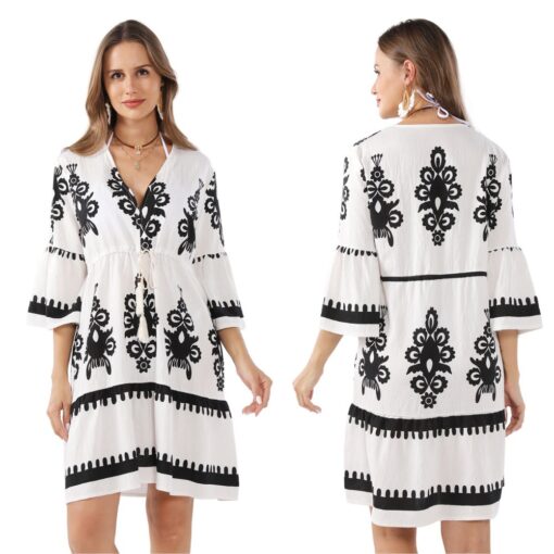 BLACK & WHITE PRINTED DRAWSTRING DRESS/COVER-UP. ONE SIZE FITS MOST. ARRIVES LATE JANUARY